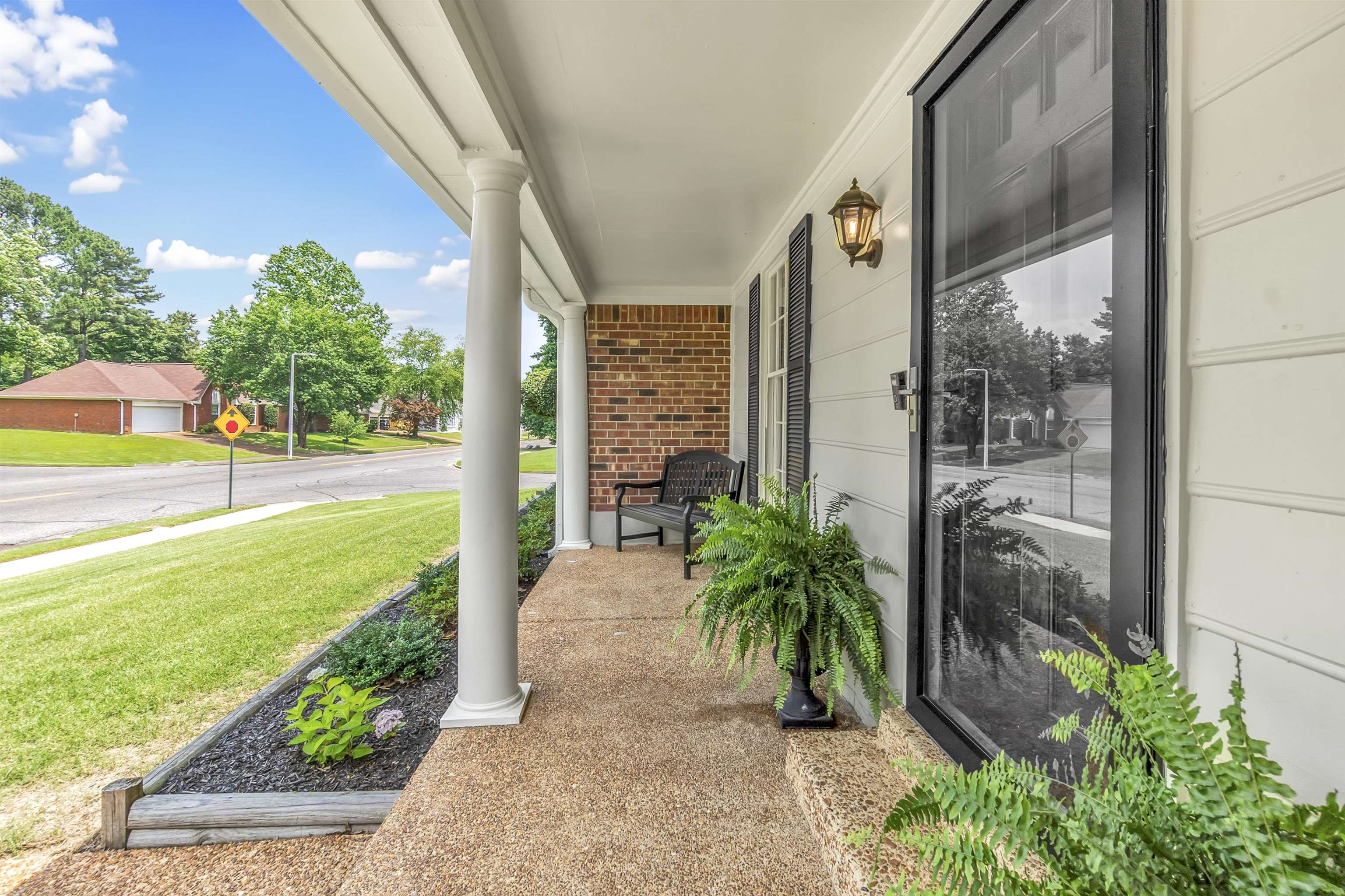 7255 Barnstable Road Memphis, TN 38125 - Photo 5 of 27 Porch featuring a lawn