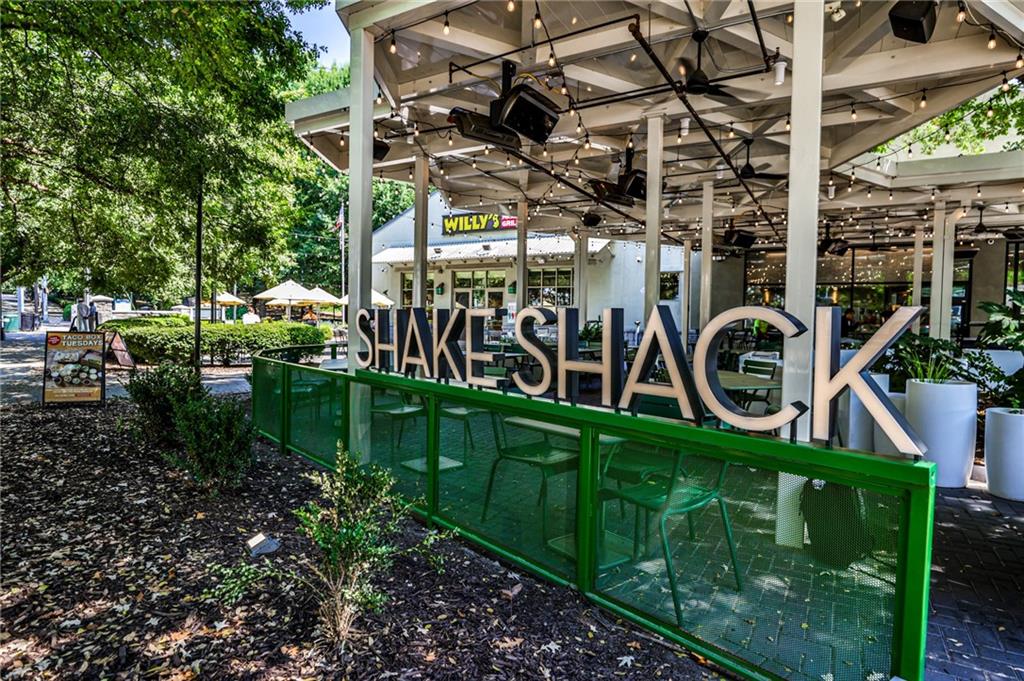1100 Piedmont Avenue Northeast, Unit 6 Atlanta, GA 30309 - Photo 12 of 16 a view of an chairs in a backyard