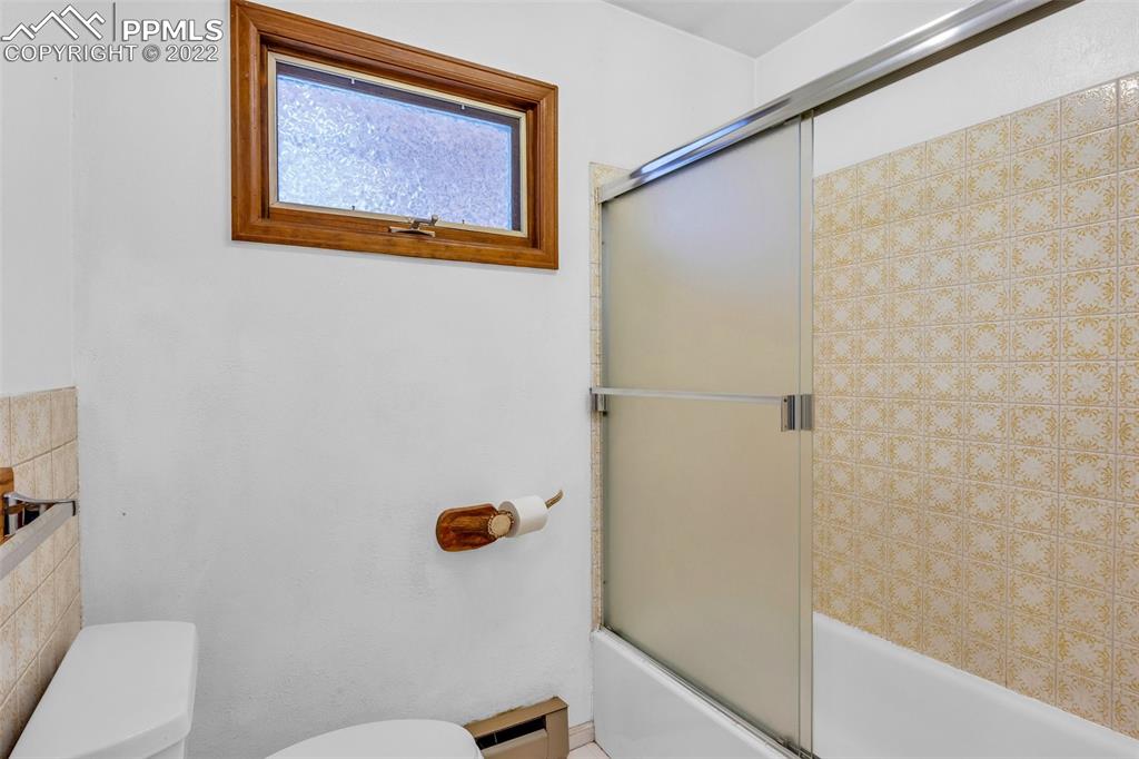 1500 Hitchrack Road Bailey, CO 80421 - Photo 19 of 43 a bathroom with a toilet and a shower