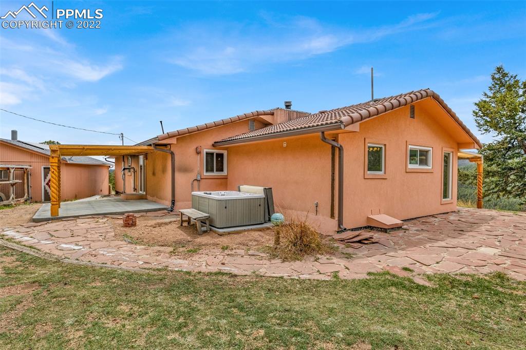 1500 Hitchrack Road Bailey, CO 80421 - Photo 24 of 43 a view of a house with backyard