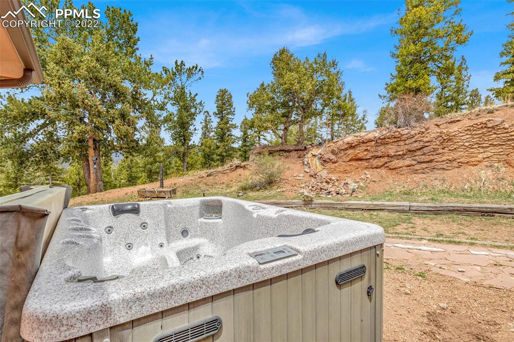 1500 Hitchrack Road Bailey, CO 80421 - Photo 26 of 43 a view of a swimming pool with an outdoor space