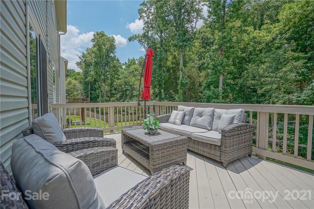 7788 East Berkeley Road, Unit 1106 Denver, NC 28037 - Photo 44 of 48 a view of a chairs in the deck