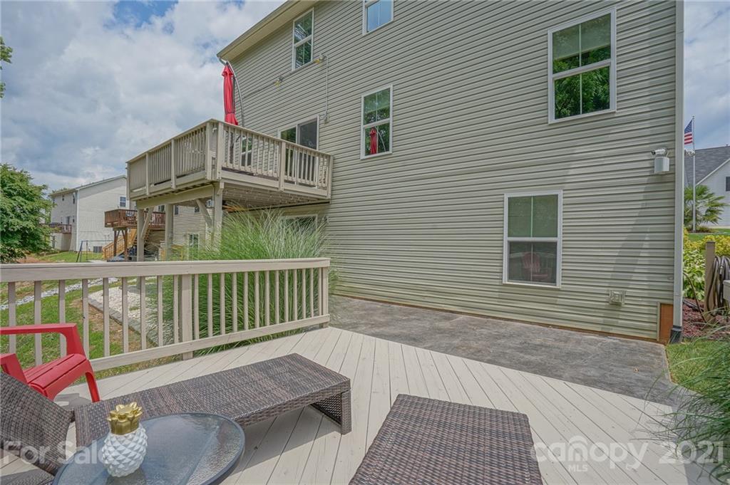 7788 East Berkeley Road, Unit 1106 Denver, NC 28037 - Photo 47 of 48 a view of a house with wooden deck