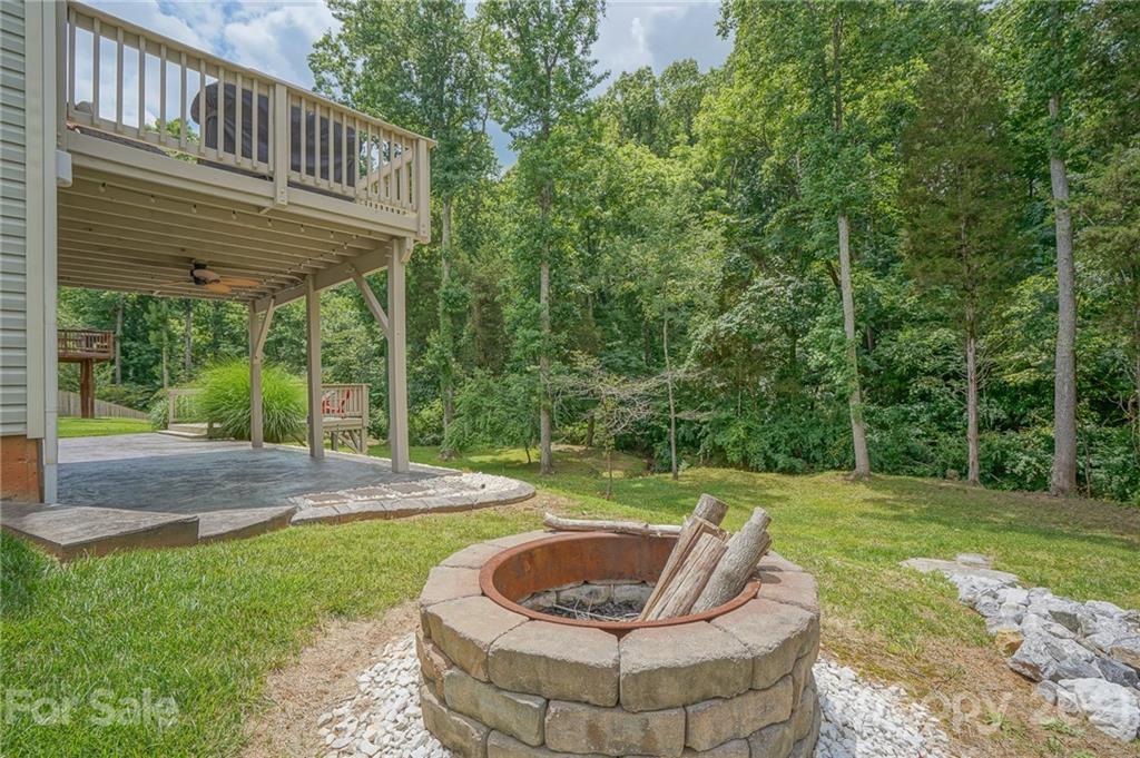 7788 East Berkeley Road, Unit 1106 Denver, NC 28037 - Photo 48 of 48 a view of a patio with a yard