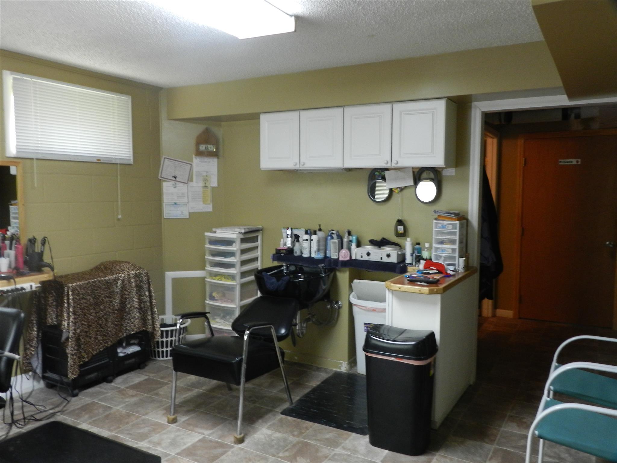 7107 Fernvale Road Fairview, TN 37062 - Photo 12 of 21 a kitchen with a refrigerator and a stove top oven