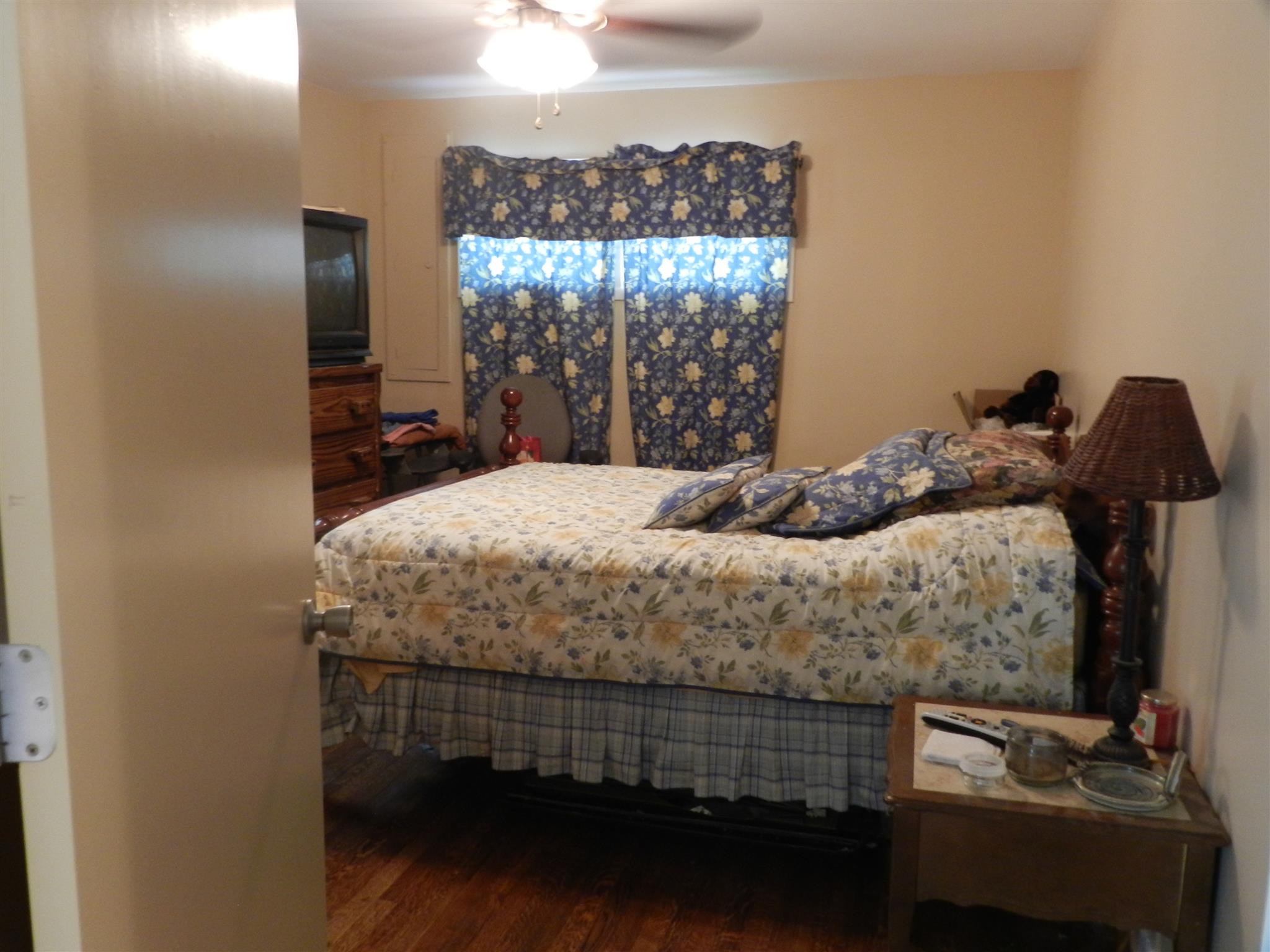 7107 Fernvale Road Fairview, TN 37062 - Photo 10 of 21 a bedroom with a bed and a window