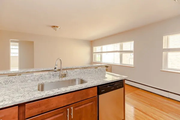 a kitchen with a sink and a window