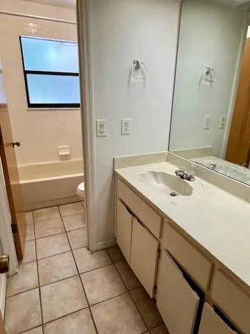 a bathroom with a sink and a bathtub