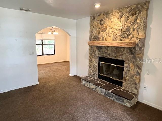 19626 Southwest 93rd Place Dunnellon, FL 34432 - Photo 3 of 14 an empty room with windows and fireplace