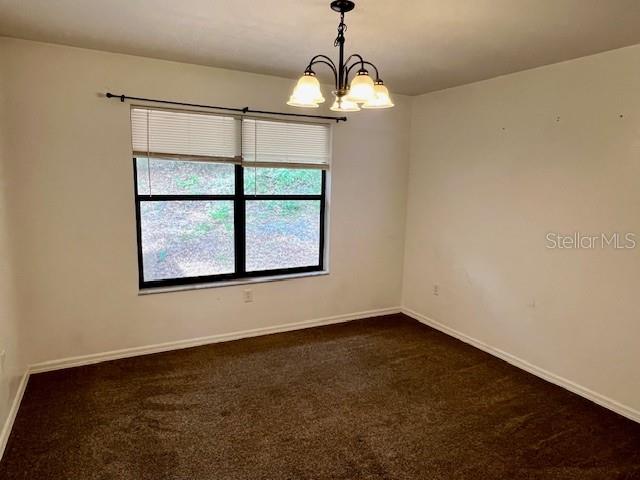 19626 Southwest 93rd Place Dunnellon, FL 34432 - Photo 5 of 14 a view of an empty room with a window