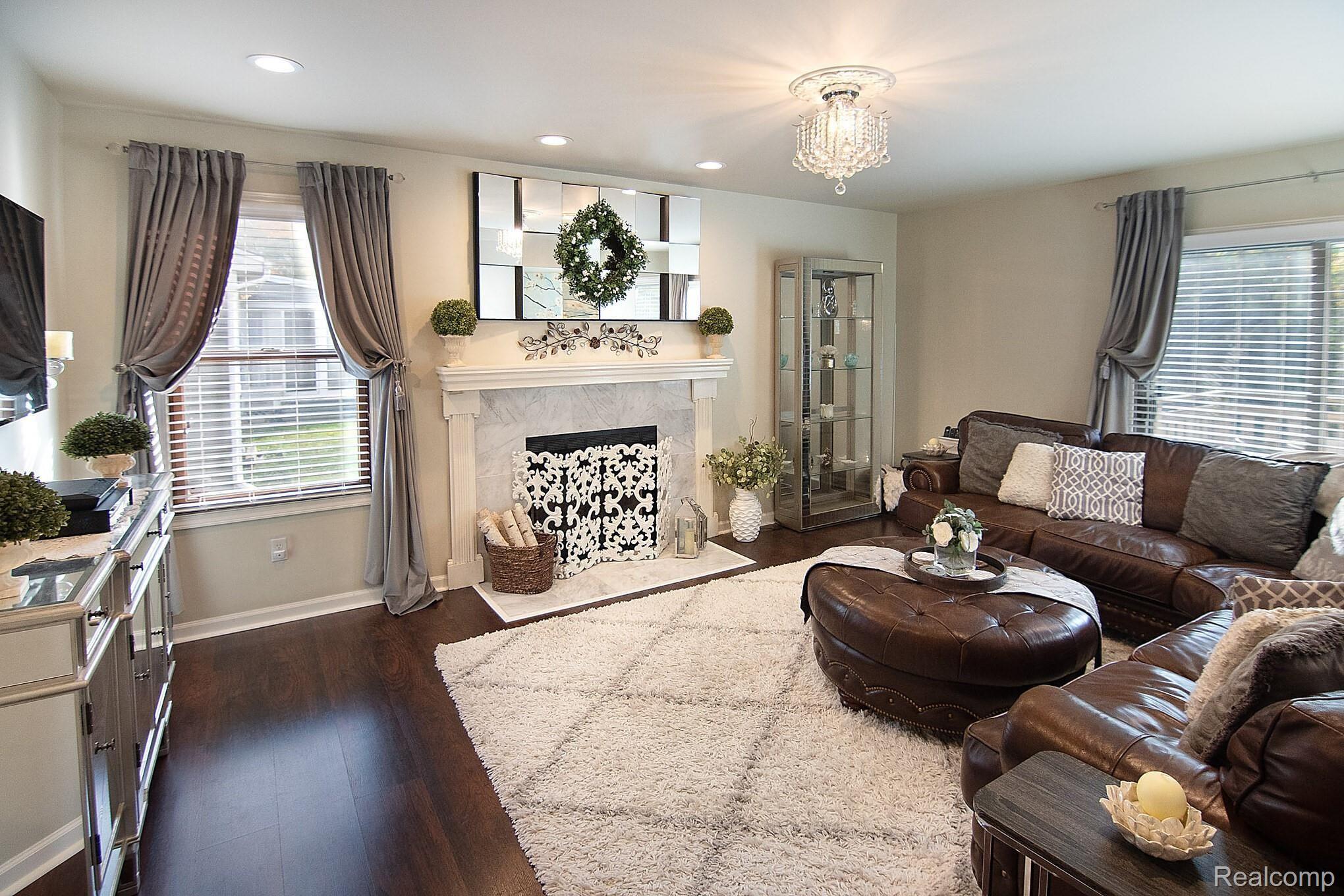 3576 Samuel Avenue Rochester, MI 48309 - Photo 5 of 31 Family room with custom Fire Place, door wall to deck, patio & newly fenced yard