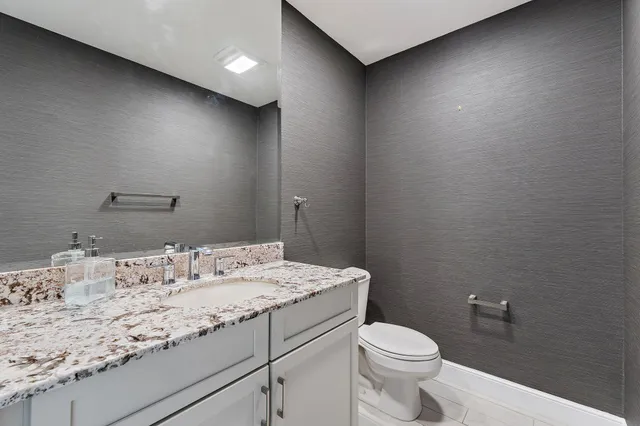 a view of a storage and utility room with washer and dryer