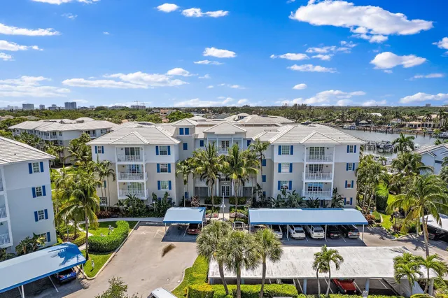a front view of a building with garden