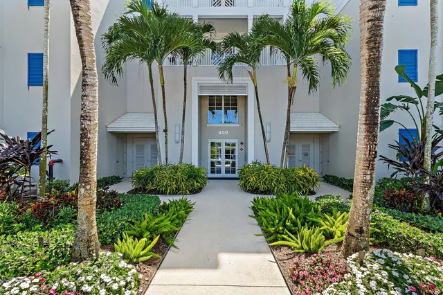 a view of hallway with wooden floor