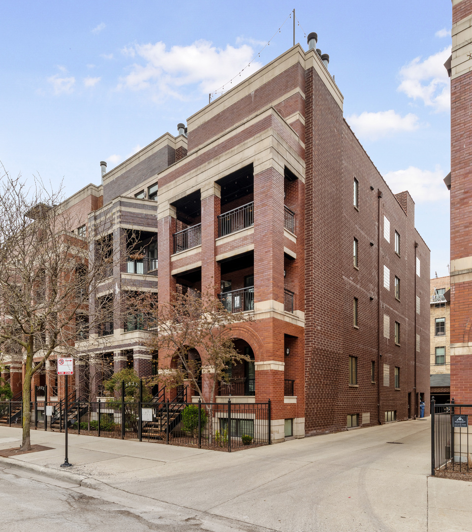 a front view of a building with street view