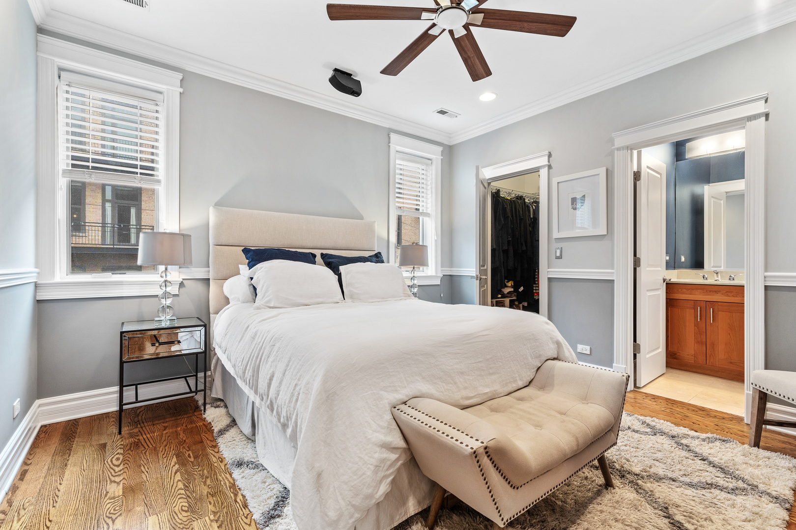 1037 West Monroe Street, Unit 3 Chicago, IL 60607 - Photo 12 of 25 a bedroom with a bed and a chair