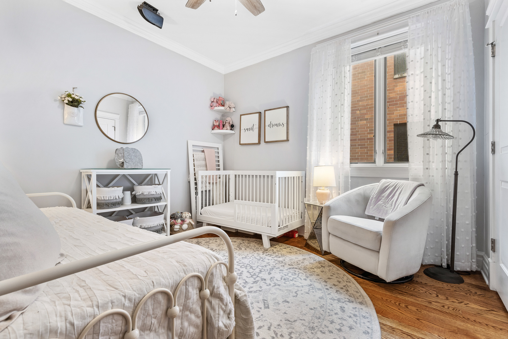 1037 West Monroe Street, Unit 3 Chicago, IL 60607 - Photo 17 of 25 a living room with furniture a window and a potted plant