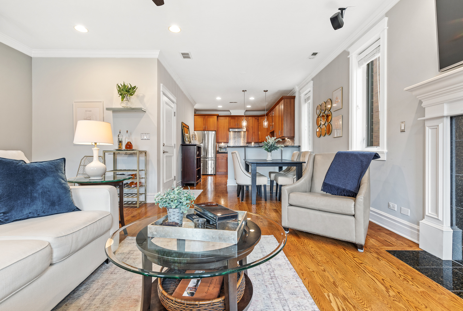 1037 West Monroe Street, Unit 3 Chicago, IL 60607 - Photo 2 of 25 a living room with furniture and a wooden floor