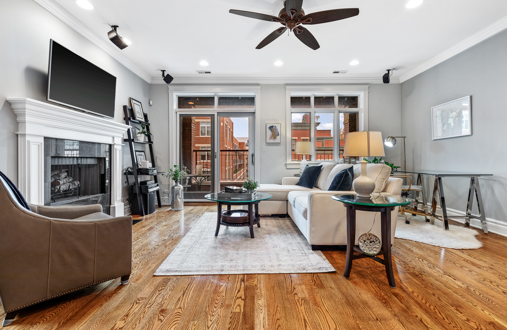 1037 West Monroe Street, Unit 3 Chicago, IL 60607 - Photo 4 of 25 a living room with furniture and a wooden floor