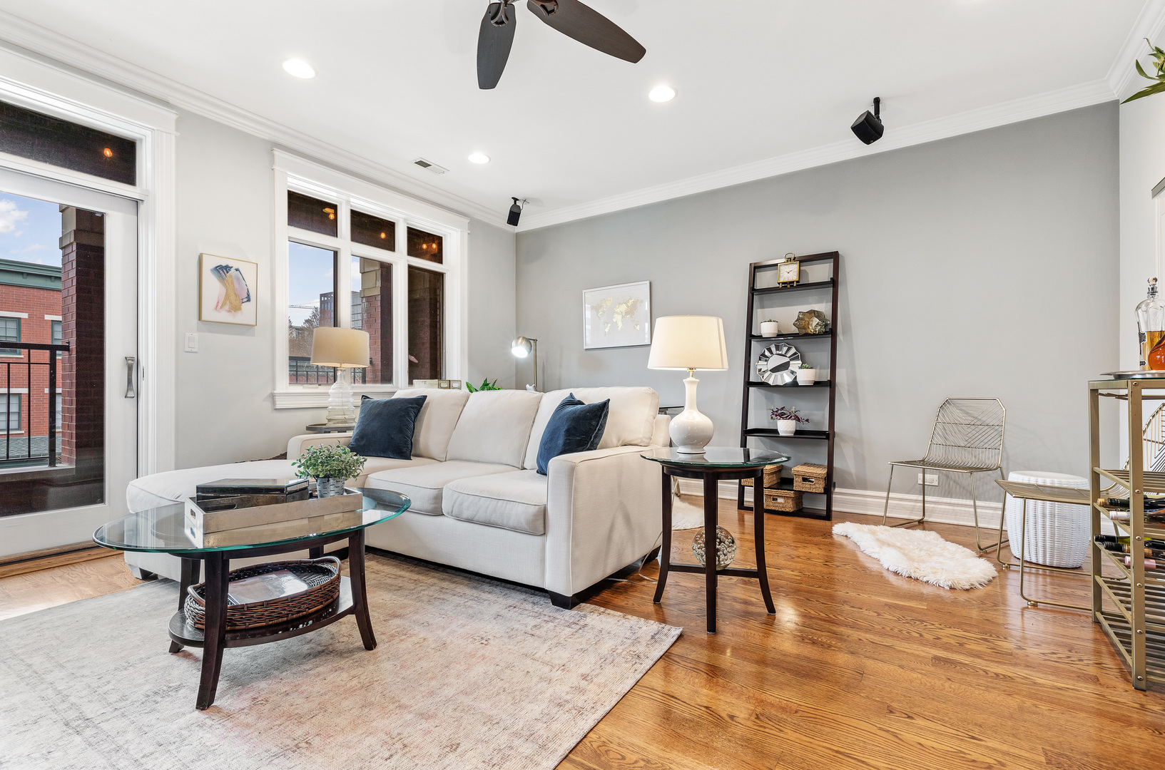 1037 West Monroe Street, Unit 3 Chicago, IL 60607 - Photo 5 of 25 a living room with furniture and a wooden floor