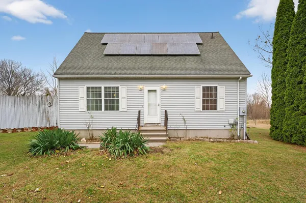 a house view with a garden space