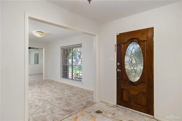 a view of a hallway with windows