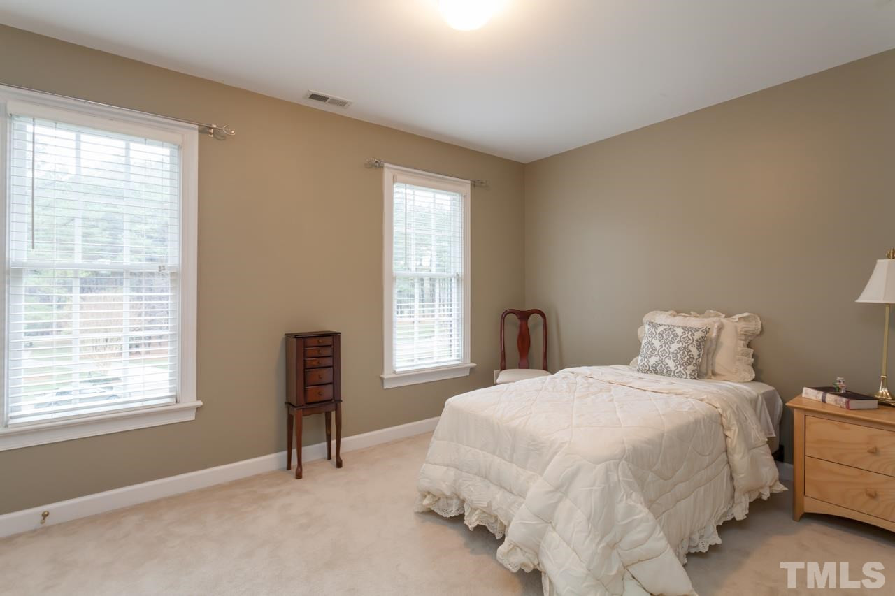 3709 White Chapel Way Raleigh, NC 27614 - Photo 13 of 25 Bedroom #2 is generous in size and offers a neutral decor, plantation blinds, and a double door closet. It is located beside a full bath. Bedroom #2