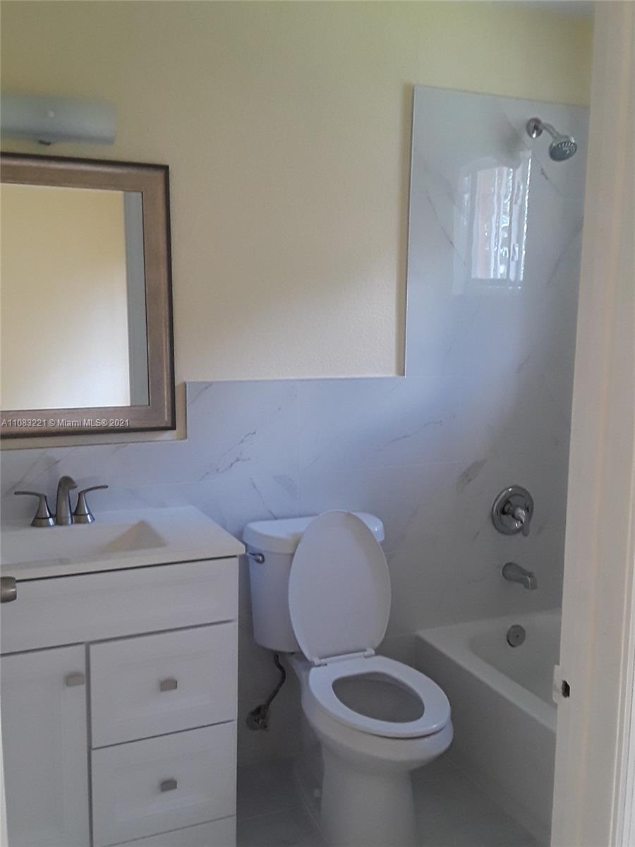 West Perrine Miami, FL 33157 - Photo 6 of 12 a bathroom with a sink a toilet and shower