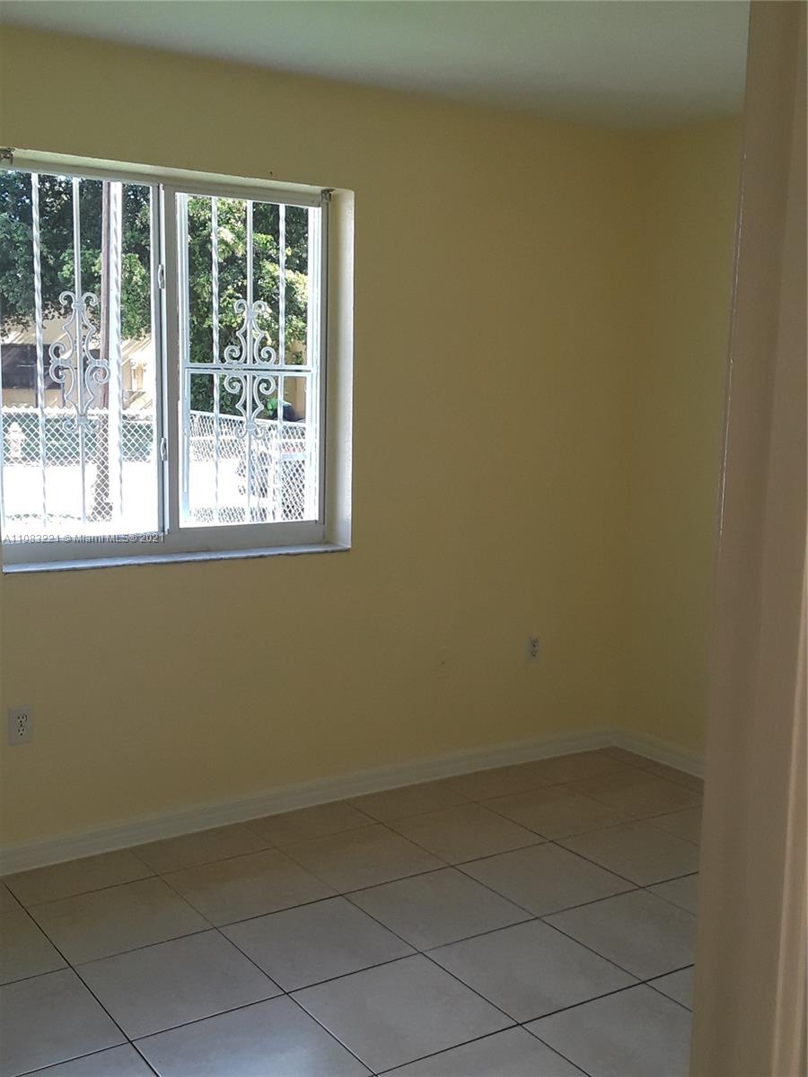 West Perrine Miami, FL 33157 - Photo 8 of 12 an empty room with a window