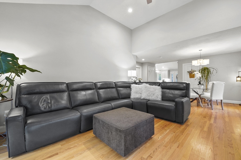 17 Turtle Lane, Unit 17 Sterling, MA 01564 - Photo 12 of 26 a living room with furniture and a wooden floor