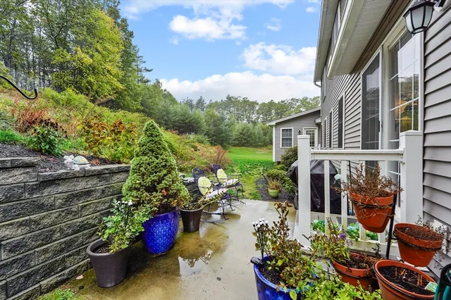 a backyard of a house with lots of green space