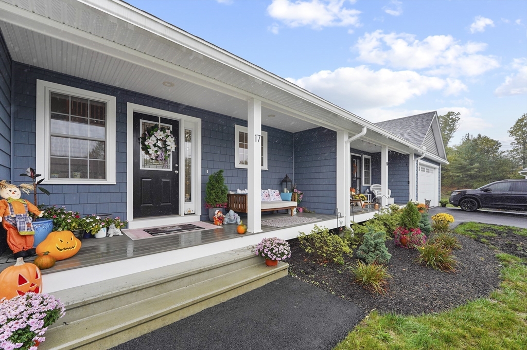 17 Turtle Lane, Unit 17 Sterling, MA 01564 - Photo 3 of 26 a front view of a house with patio