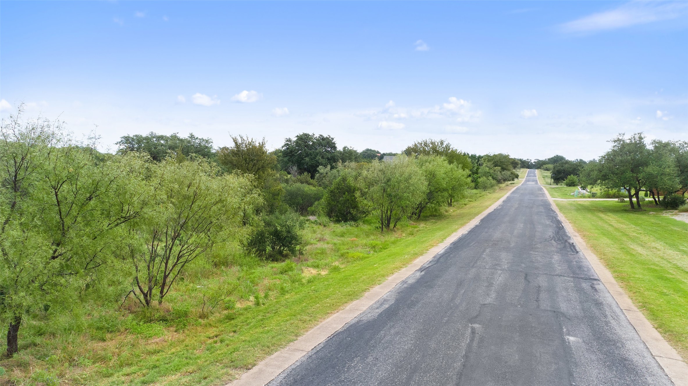 108 Cross Trail Spicewood, TX 78669 - Photo 11 of 33 Cross Trail Road leading to the property