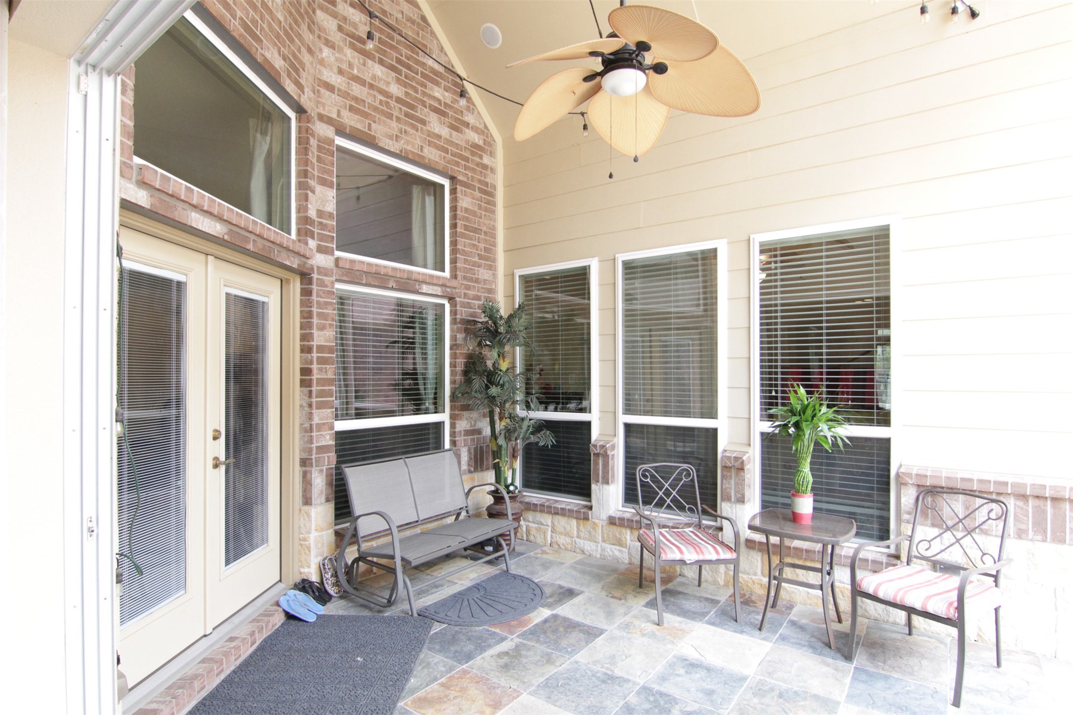 1423 Ralston Branch Way Sugar Land, TX 77479 - Photo 18 of 43 covered back patio with ceiling fan (new one replaced one in photo)