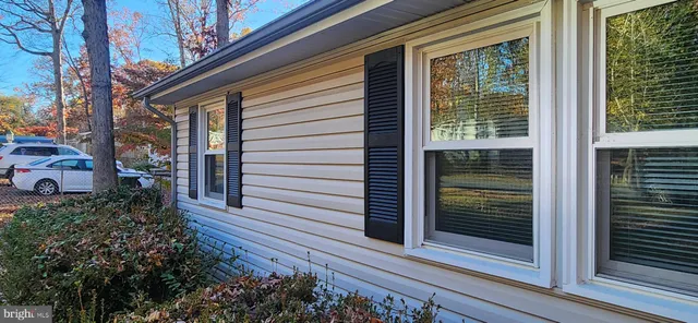 a view of a door and a window
