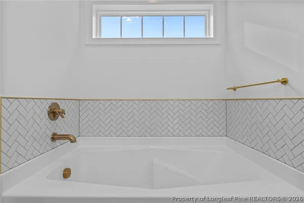 a bathroom with a bathtub