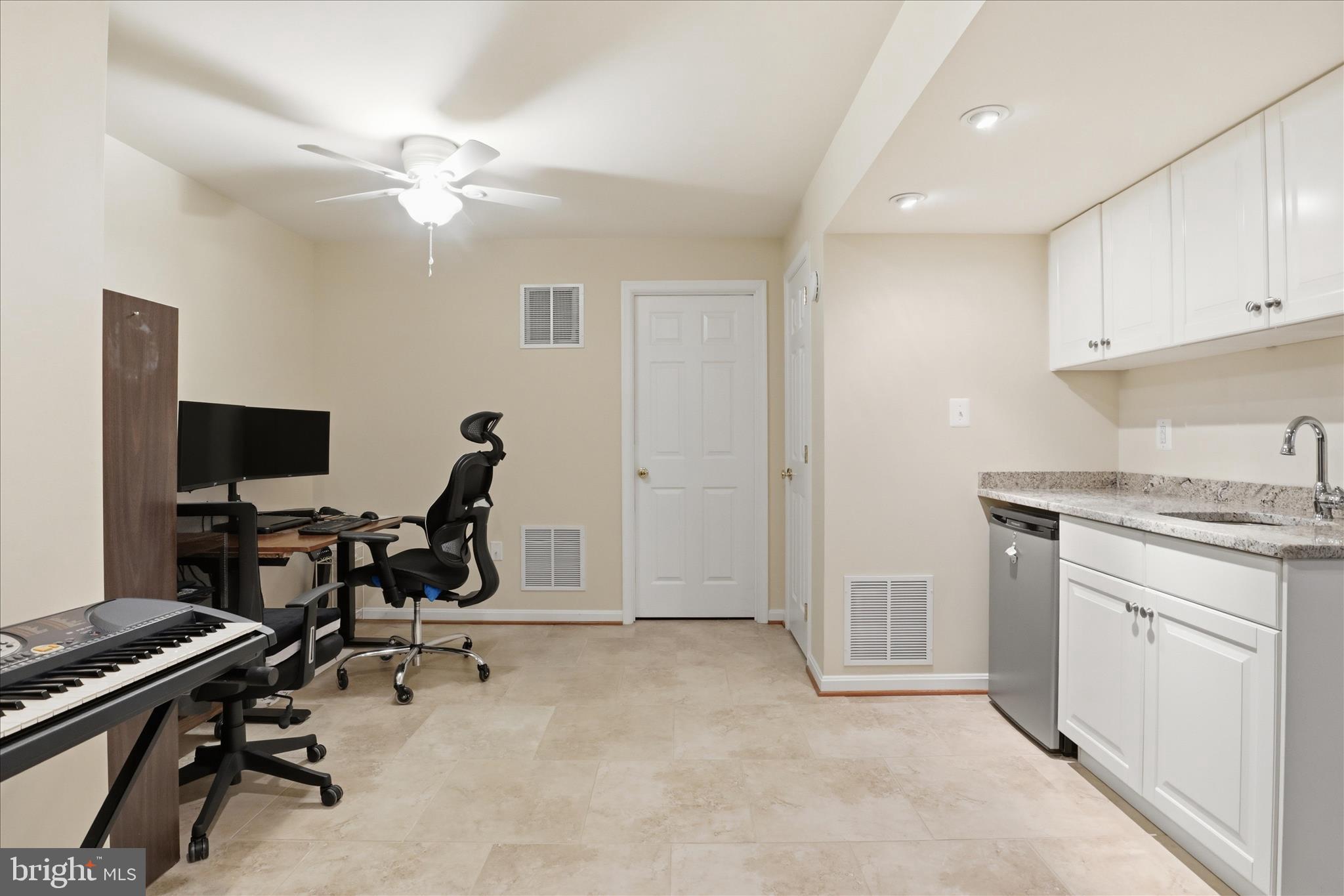 25352 Ripleys Field Drive Chantilly, VA 20152 - Photo 26 of 54 a view of a workspace with furniture and a window
