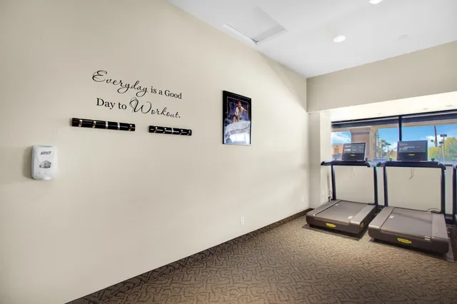 a view of a room with gym equipment