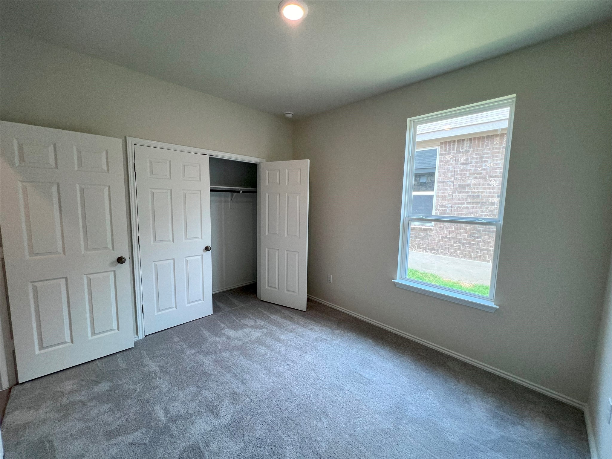 427 Tree Nut Loop Buda, TX 78610 - Photo 21 of 38 an empty room with windows