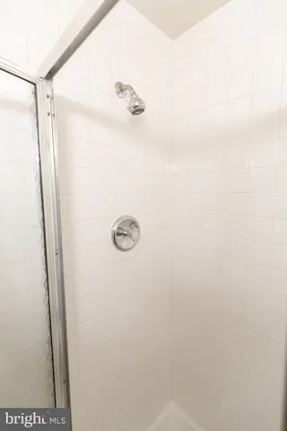 a bathroom with a sink a mirror and vanity