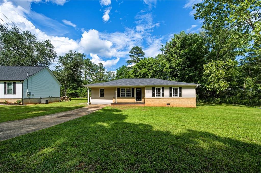 300 Cash Town Road Aragon, GA 30104 - Photo 2 of 28 a front of a house with a garden