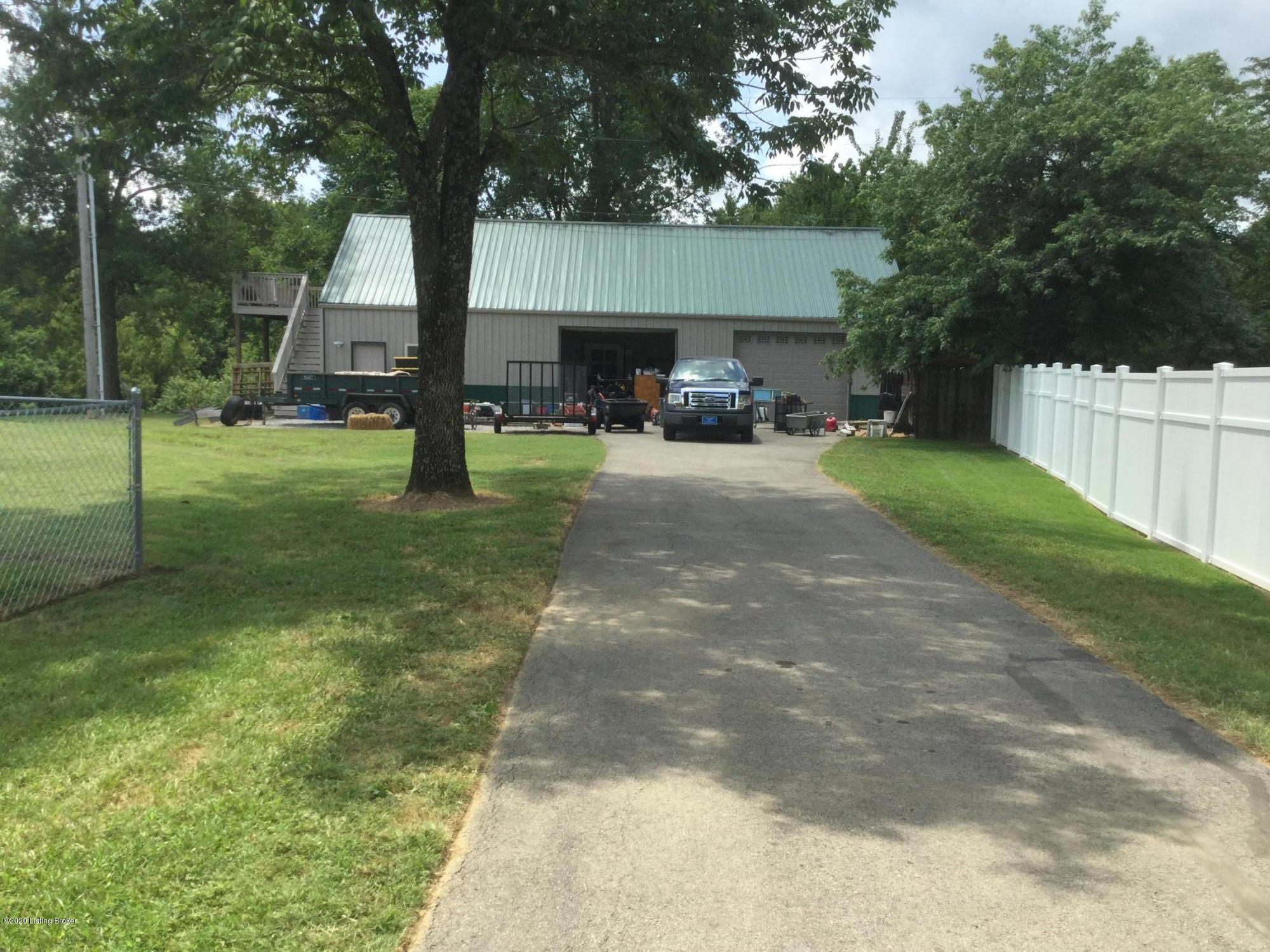 2468 Beech Grv Road Shepherdsville, KY 40165 - Photo 7 of 32 30x60 metal building with 2 garage doors and painting booth