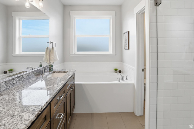 1009 High Creek Road Cove, UT 84320 - Photo 30 of 79 Ensuite Full bathroom with vanity, a bath, double headed tiled shower and light tile patterned flooring
