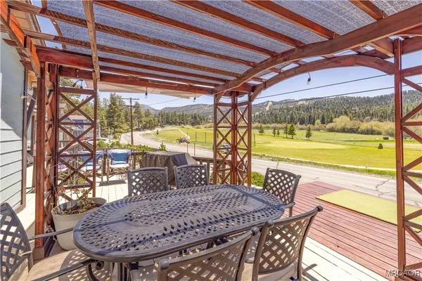 a view of a swimming pool with a patio