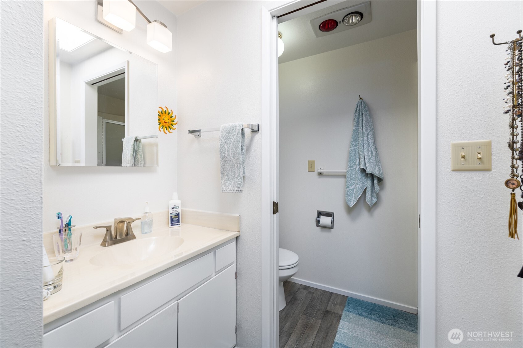 494 Colville Way La Conner, WA 98257 - Photo 22 of 39 a bathroom with a sink vanity and toilet