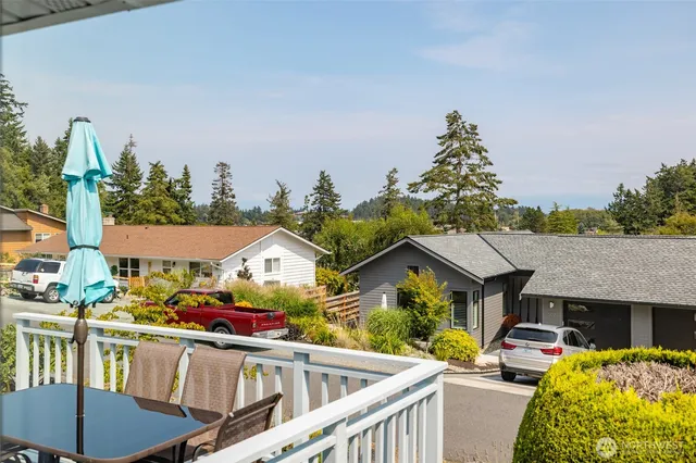 a view of multiple houses with a patio