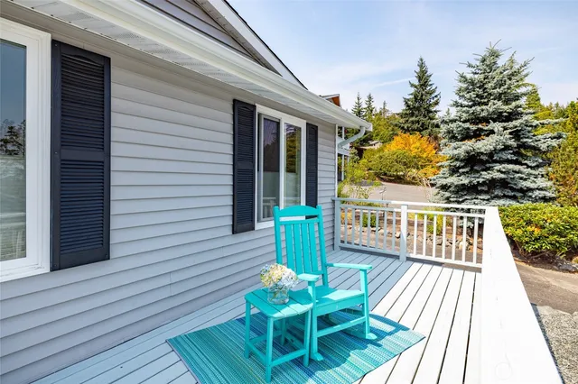a view of a chairs on the deck