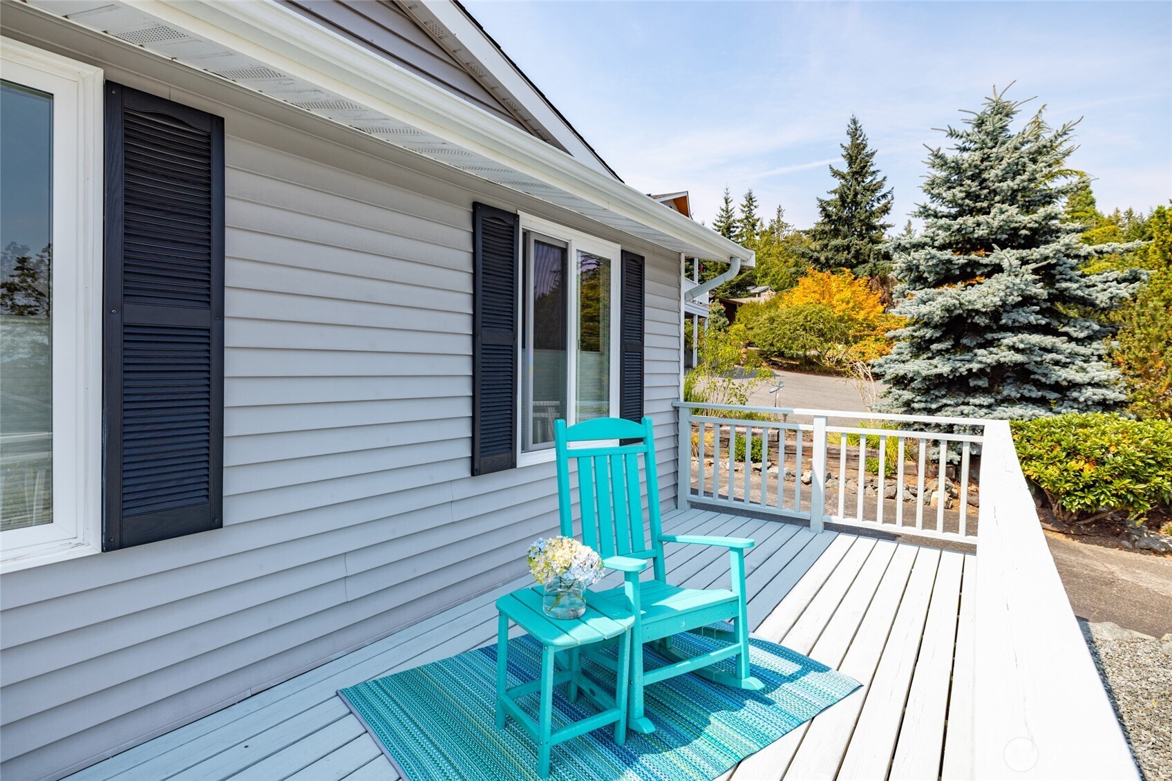494 Colville Way La Conner, WA 98257 - Photo 25 of 39 a view of a chairs on the deck