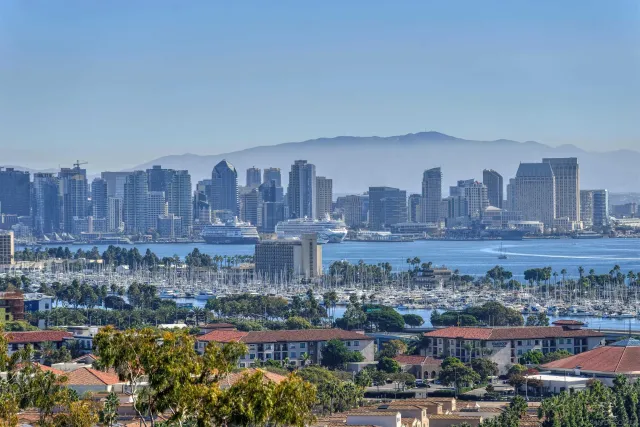 a view of a city with tall buildings