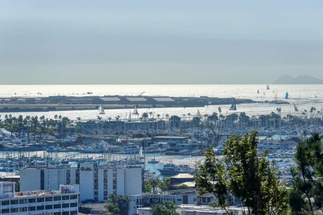 a view of a city with tall buildings